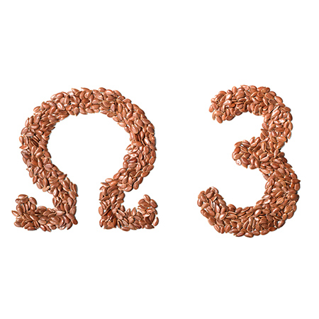 uncooked flax seeds on white Articolo31 HeaderMobile